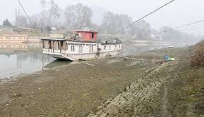 Dry winter and rising temperatures leave Kashmir’s lifeline Jhelum river at historic low