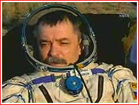 Russian cosmonaut Mikhail Tyurin minutes after landing, April 21, 2007. Credit: NASA - iss_soyuztma9_land_tyurin_2