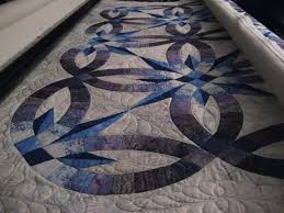 Résultat de recherche d'images pour "judy niemeyer double wedding ring quilt"