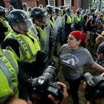 Anti-racist protesters and activists march through the streets of Charlottesville