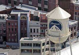 A graphic showing the logos of Paramount, Warner Bros., and Skydance merging into a single corporate identity.