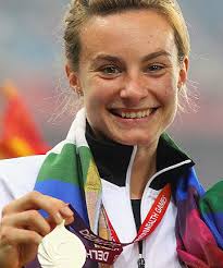 SHINY: Nikki Hamblin is all smiles after claiming the silver medal in the women&#39;s 1500m at the Commonwealth Games in Delhi, 2010. - 9763438