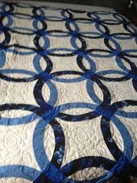 Résultat de recherche d'images pour "judy niemeyer double wedding ring quilt"