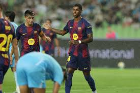 Marcus Rashford jokes with Lamine Yamal before scoring first Barcelona goal