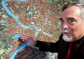 Gilles Chaillet with a reproduction of his hand-drawn map of ancient Rome, which was presented Thursday at the French Cultural Institute in Rome. - 041008_RomeMap_Hlarge_220p.grid-6x2