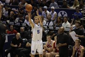 BYU Cougars basketball players celebrating against Nebraska