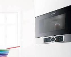 Image of modern Bosch microwave oven in kitchen settings