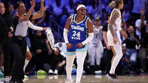 Arike Ogunbowale celebrating after scoring a record 45 points for the Dallas Wings