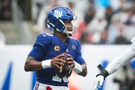 Jameis Winston arriving in rainy weather before the Giants Week 5 game