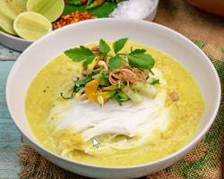 A delicious bowl of Num Banh Chok, Khmer noodles with fresh vegetables.