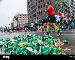 Image of someone running a marathon with a pile of paperwork