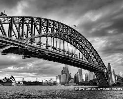 black and white photograph of Sydney Harbour Bridge under construction