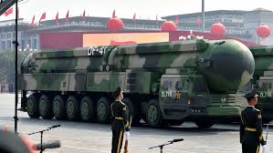 China fires ICBM into Pacific Ocean in first such public test in decades as 
regional tensions flare