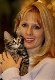 Julie holds her nine-week-old cat &#39;Little Nicky&#39; Wednesday, Dec. 22, 2004 in Texas. &#39;Little Nicky&#39; a successfully cloned ... - W020041224501958026951