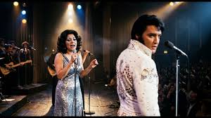 During the show, Elvis noticed one of his backup singers was ...