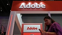 Earnings live: Adobe stock rises on upbeat sales outlook, RH slides as tariffs bite
