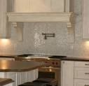 This is one gorgeous sparkly backsplash! The white cabinetry