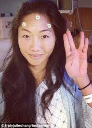 Looking forward: Julie Chang has been nicknamed &#39;One Eyed Willie&#39; after brain tumor surgery impacted her vision - article-0-1A222BDB00000578-367_306x423