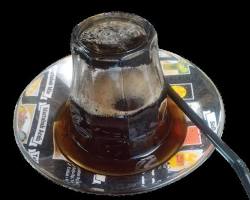 Jelajah Surga Kuliner Khas Aceh Kopi Aceh disajikan dengan gelas kaca