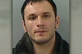 Police picture of Ovidiu Nedelcu. TWO Romanian men took part in a Teesside cashpoint scam described by a judge as “every account holder&#39;s nightmare”. - baby-image-1-43922675
