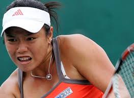Chan Yung-Jan of Taiwan returns a ball to Mara Santangelo of Italy during the women singles ... - 2367l