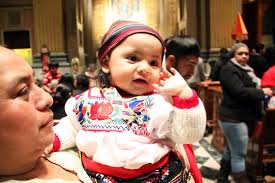 Little Maritza Cruz from Saint Joan of Arc Parish enjoys the celebration at the Cathedral. - IMG_9141