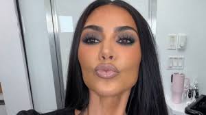 Kim Kardashian Is Almost Unrecognizable in Scary Blue Hair & Black Teeth Halloween Photos