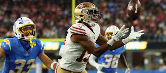 Who Should I Start? Deebo Samuel Sr. or Kenneth Walker - fantasyfootballcalculator.com