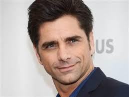 More people may be looking better than ever as they hit the milestone age of the big 5-0, but few can say they wear it as well as John Stamos. - 6C8670836-6c8284491-130716-john-stamos.blocks_desktop_small