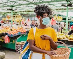 Image of person shopping at a local market