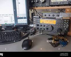 modern amateur radio transceiver with CW telegraph key on desk photo, AI generated