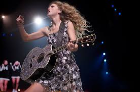 Hasil gambar untuk foto taylor megang gitar