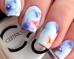 Hình ảnh về Watercolor floral acrylic nails