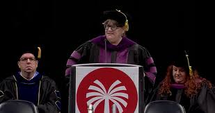 College students boo after a 'new AI system' misses names during graduation ceremony
