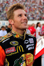 Jamie McMurray, driver of the #1 Bass Pro Shops/Tracker Boats Chevrolet, stands on the grid prior to the start of the NASCAR Sprint Cup ... - Jamie%2BMcMurray%2BIRWIN%2BTools%2BNight%2BRace%2BOgTI0XnCQuUl