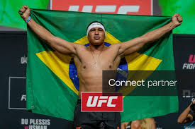 Licensable picture: Levi Rodrigues walks on stage with the flag of Brazil during the ceremonial weigh-in for UFC Fight Night at Paycom Center in