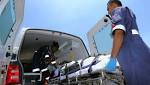 Woman, injured after falling Table