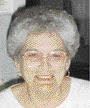 She is survived by her son, Larry Putman ... - 0000970904-01-1_20130123