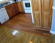 Wood floor transitions between rooms