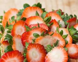 Removing strawberry caps and stems