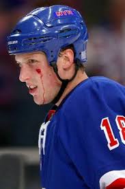 Even when bloodied, Marc Staal fears no man. (www.thehockeyjunkies.com). The names on the list of defensemen left to evaluate are rapidly coming to a close. - marc-staal-tears-of-blood