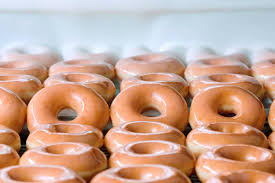 Krispy Kreme is giving away free doughnuts — if you dress the part. What to 
know