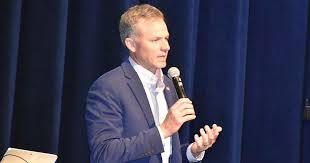 U.S. Rep. Blake Moore touts tax cuts, Trump savings accounts for kids to local GOP delegates
