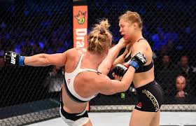 Ronda Rousey responds to Holly Holm’s rematch request, would ‘clean her clock’ and ‘re-write’ UFC history