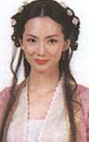 As the fairy Mu Dan, I think Fei Li is even prettier than Xiu Zhen. She is eye-catchy in her purple gown with purple peony flowers in her hair. - eight07