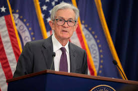 A divided Federal Reserve cuts interest rates for a 3rd straight time
