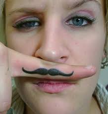 Tattooing by Margaret Bushell - dontcha wish you had a finger moustache tattoo too? - fnBcVuKU