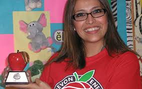 Raquel Sosa-Gonzalez, a reading teacher at HISD&#39;s Las Américas School, was one of three HISD educators to be named a &quot;Teacher of the Game&quot; by the Houston ... - LasAmericas_TOTG_300