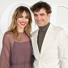 Robert Pattinson and Girlfriend Suki Waterhouse Make Red Carpet Debut At 
Dior Fashion Show