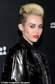 The winds of change: Miley Cyrus pictured an image of herself during her elementary school years on Twitter, beneath which her real name - Destiny Cyrus ... - article-2478742-1A4ADEC4000005DC-363_306x463